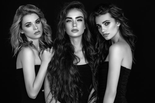Three beautiful girls with perfect hair and make-up
